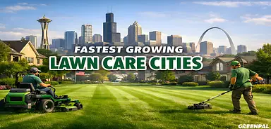 Two men are mowing lawns in front of city skylines and residential homes.